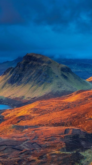 Mountain landscape with lake and dramatic sky 4K