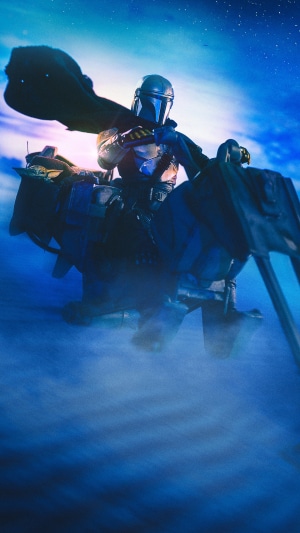 The Mandalorian on a speeder bike