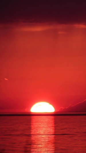 Sunset over a lake with reflection