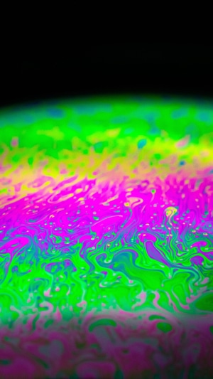 Abstract soap bubble surface with vibrant colors