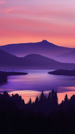 Digital art of a lake and mountains at sunset