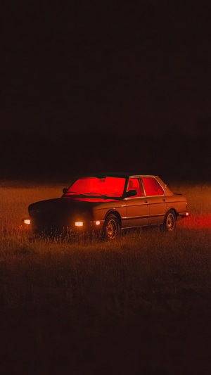 Car with red interior lights at night