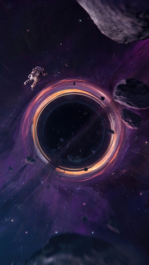 Astronaut floating near a black hole in space