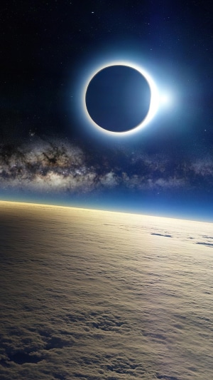 Total Solar Eclipse over Earth's Atmosphere