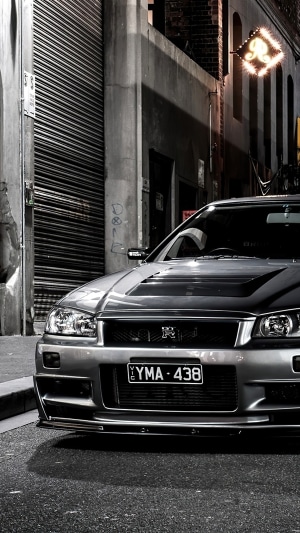 Nissan GT-R R34 parked in alley