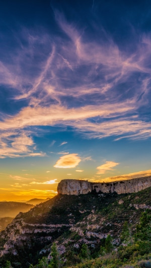 Mountain landscape with dramatic sunset sky in Spain