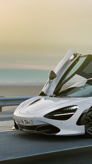 White McLaren 720S with butterfly doors open