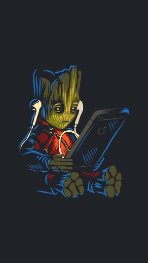Baby Groot from Guardians of the Galaxy with headphones and phone