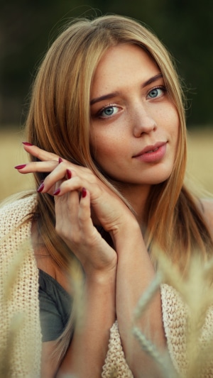 Young woman with blonde hair and blue eyes