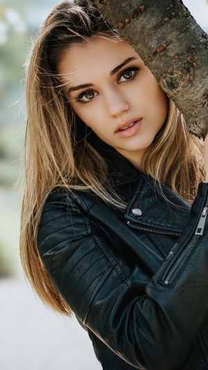 Model in Leather Jacket by Tree