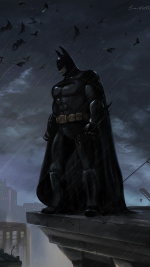 Batman standing on a rooftop with bats flying