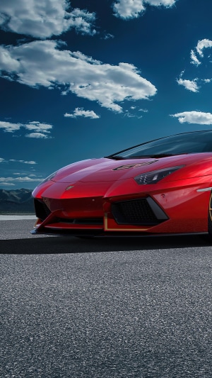 Red Lamborghini Aventador SVJ 63 on asphalt