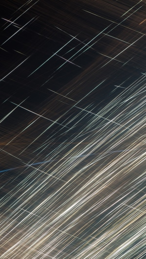 Abstract light streaks on dark background