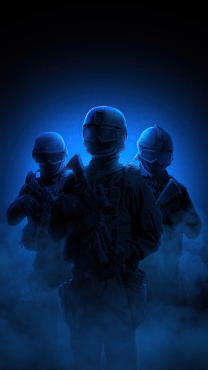 Three soldiers in blue smoke