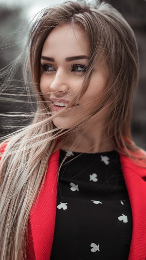 Blonde girl in red jacket