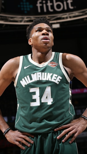 Giannis Antetokounmpo wearing Milwaukee Bucks jersey #34