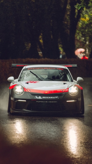 Porsche 911 GT3 RS driving in the rain