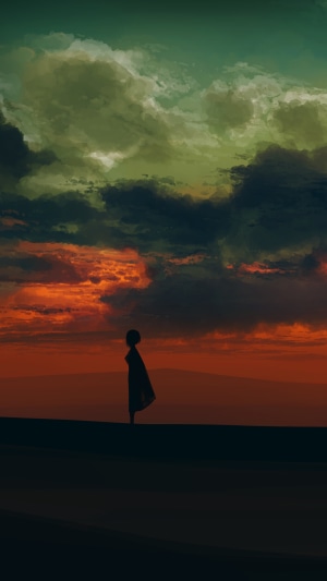 Silhouette of a person against a dramatic sunset