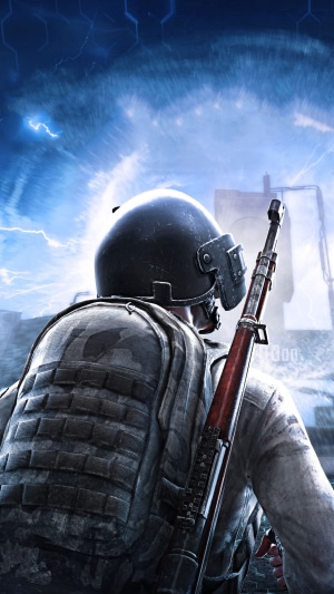 PlayerUnknown's Battlegrounds character with rifle and backpack