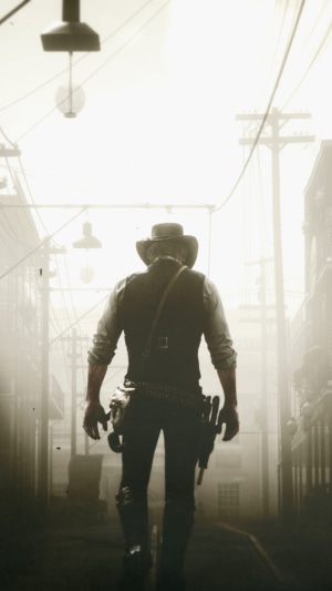 Arthur Morgan from Red Dead Redemption 2 walking in a misty street