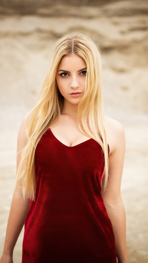 Blonde model in red dress