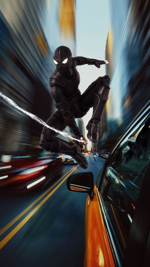 Spider-Man in Black Suit Swinging Through City