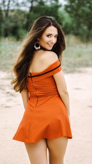 Woman in orange dress