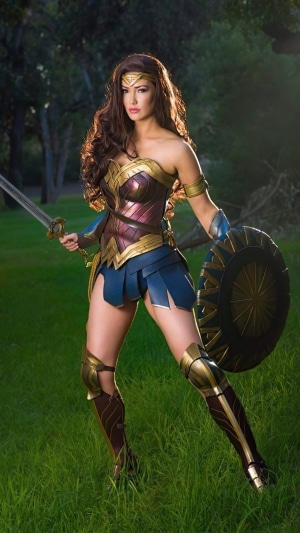 Wonder Woman holding sword and shield