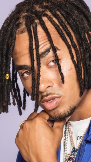 Ozuna with dreadlocks and jewelry