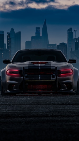 Dodge Charger with police push bumper in city