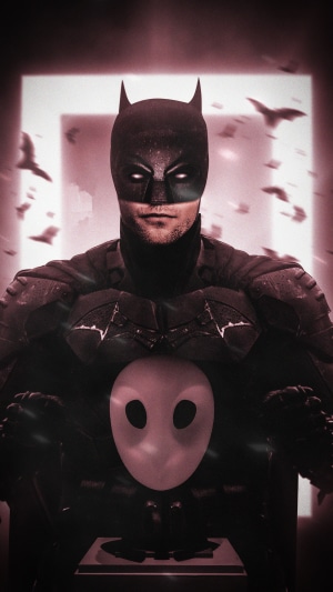 Batman holding the Owl mask from The Batman 4K