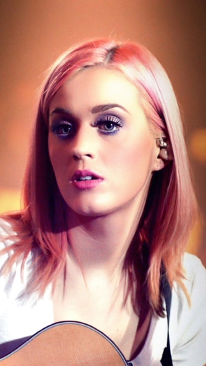 Katy Perry playing guitar
