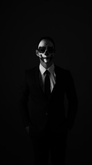 Man in suit with skull face paint