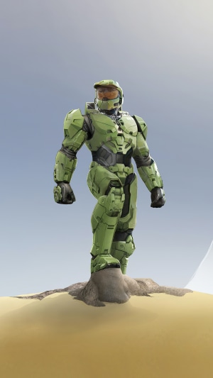Master Chief from Halo standing on a sandy dune