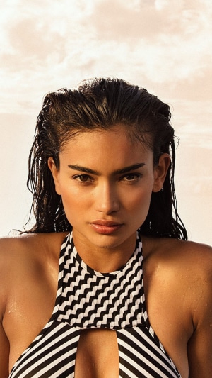 Kelly Gale in a black and white striped bikini