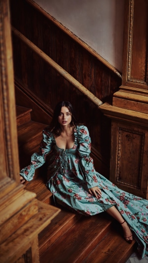 Ana de Armas on wooden stairs