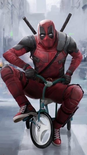 Deadpool on a tricycle in a city