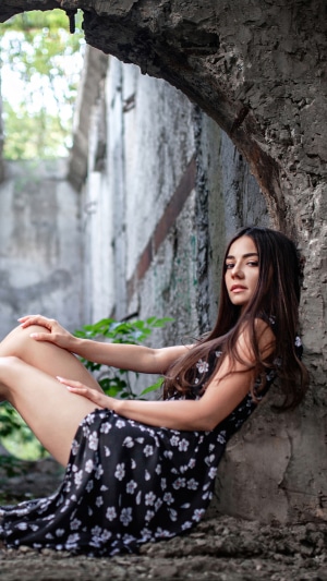 Model in a floral dress in ruins