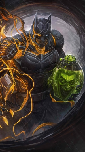 Batman holding a jar with the Joker's face