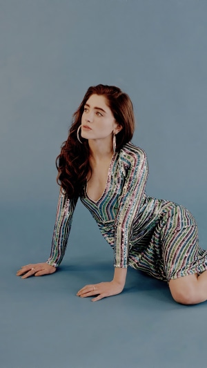 Natalia Dyer in a sequined dress