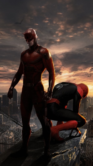 Daredevil and Spider-Man on a rooftop at sunset