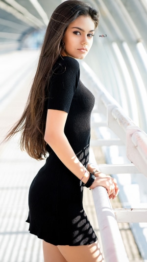 Nicole Ceretta in a black dress