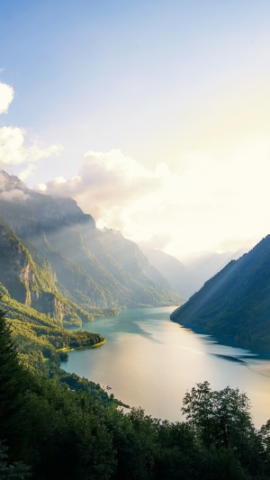 Mountains and lake at sunrise, 4K