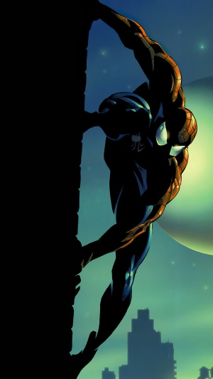 Spider-Man climbing a wall at night