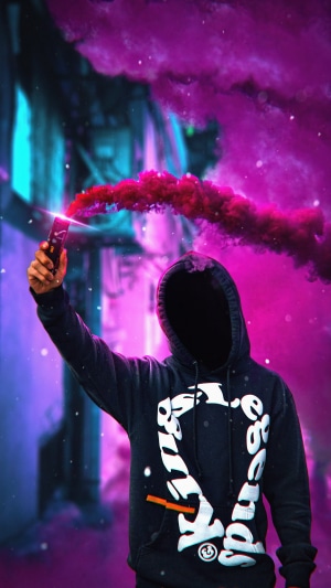 Anonymous figure holding purple smoke flare