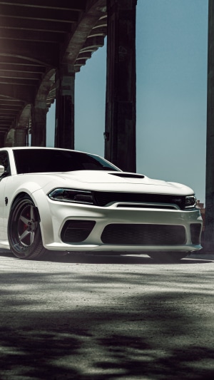 White Dodge Challenger SRT Hellcat Widebody under bridge