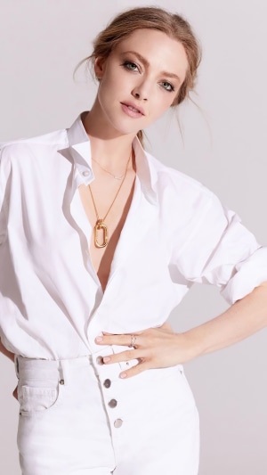 Amanda Seyfried in white shirt and jeans