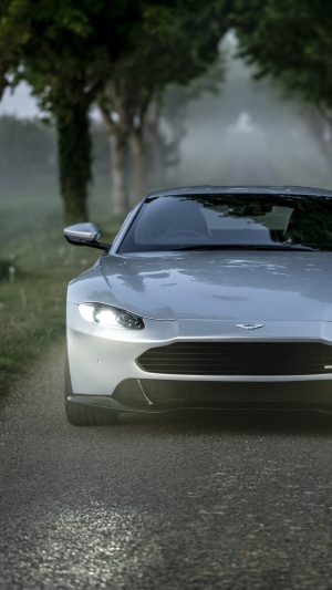 Aston Martin Vantage on a foggy road