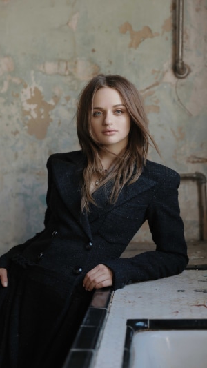 Joey King in a black jacket