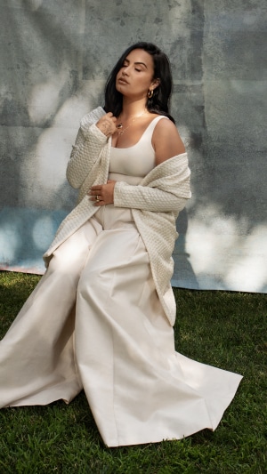 Demi Lovato in cream outfit outdoors